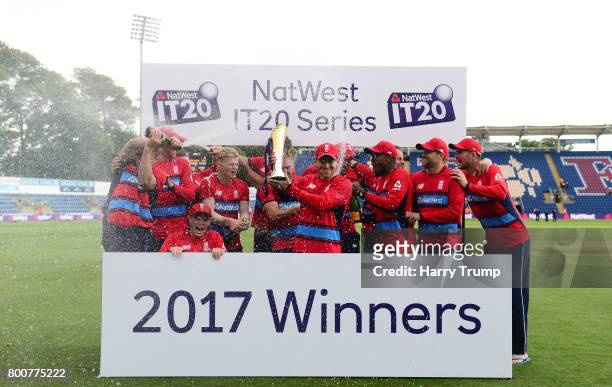 The England side pose with the trophy during the 3rd NatWest T20 International between England and South Africa at the SWALEC Stadium on June 25,...