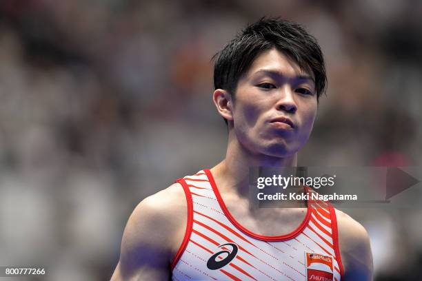 Kohei Uchimura looks on after competing in the Horizontal Bar during Japan National Gymnastics Apparatus Championships at the Takasaki Arena on June...