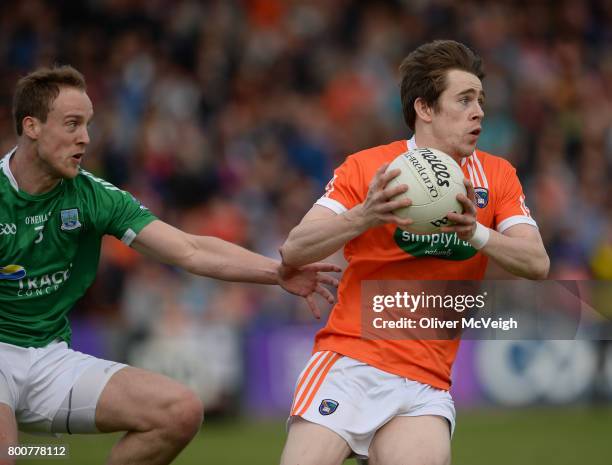 Armagh , Ireland - 25 June 2017; Andrew Murnin of Armagh in action against Che Cullen of Fermanagh during the GAA Football All-Ireland Senior...