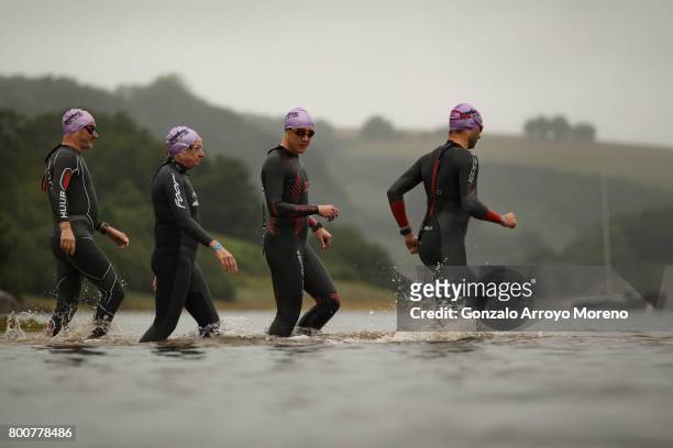 Athletes compete during the swimming course of the Ironman 70.3 UK Exmoor at Wimbleball Lake on June 25, 2017 in Somerset, United Kingdom.