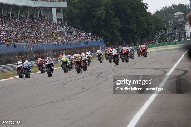 The Moto2 riders start from the grid during the Moto2 Race during the MotoGP Netherlands - Race on June 25, 2017 in Assen, Netherlands.