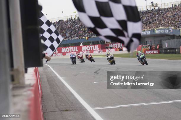 Franco Morbidelli of Italy and EG 00 Marc VDS cuts the finish line during the Moto2 Race during the MotoGP Netherlands - Race on June 25, 2017 in...