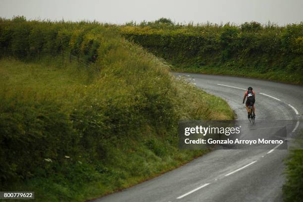 An athlete competes during the biking course of the Ironman 70.3 UK Exmoor at Wimbleball Lake on June 25, 2017 in Somerset, United Kingdom.