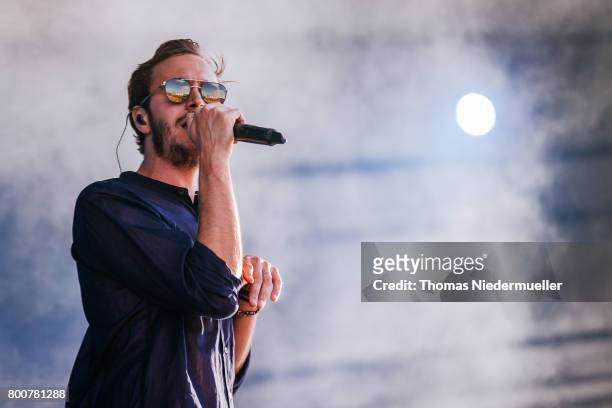 Tom Smith of Editors performs during the third day of the Southside festival on June 25, 2017 in Neuhausen, Germany.