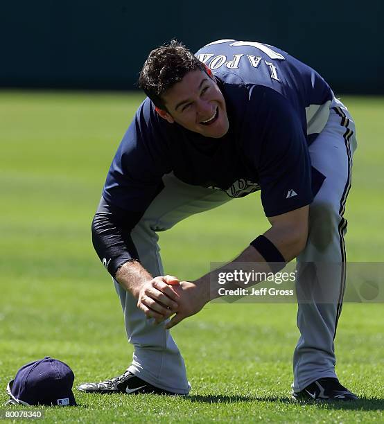 Matt LaPorta of the Milwaukee Brewers stretches prior to the spring training game against the Colorado Rockies at Hi Corbett Field March 1, 2008 in...