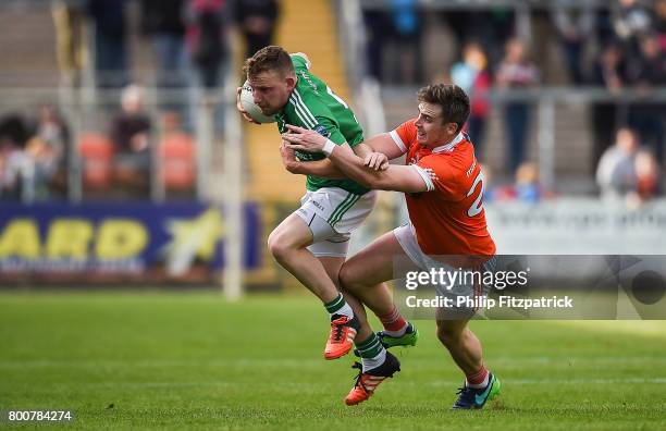 Armagh , Ireland - 25 June 2017; Aidan Breen of Fermanagh in action against Ciaran O'Hanlon of Armagh during the GAA Football All-Ireland Senior...