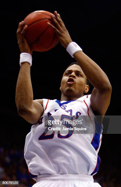 Brandon Rush of the Kansas Jayhawks shoots against the Kansas State Wildcats during the first half of the game on March 1, 2008 at Allen Fieldhouse...