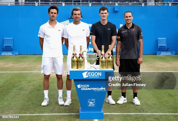Runners up, Julien Benneteau of France, Edourd Roger-Vasselin of France and Winners, Jamie Murray of Great Britain and Bruno Soares of Brazil stand...