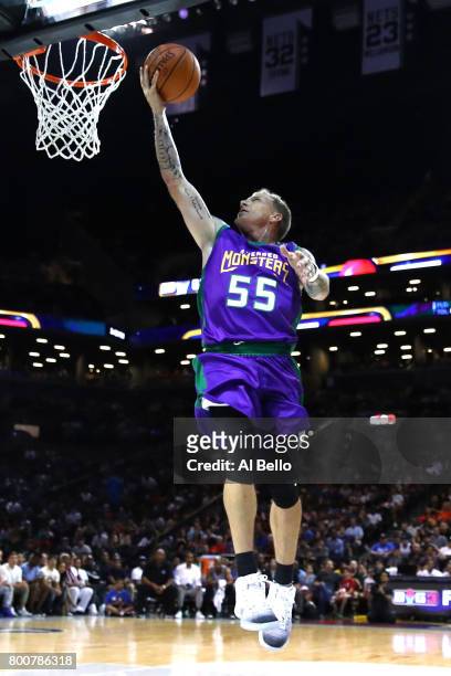 Jason Williams of the 3 Headed Monsters drives to the basket against the Ghost Ballers during week one of the BIG3 three on three basketball league...