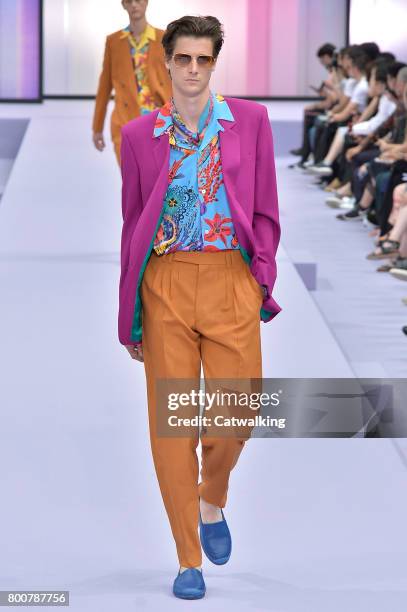 Model walks the runway at the Paul Smith Spring Summer 2018 fashion show during Paris Menswear Fashion Week on June 25, 2017 in Paris, France.