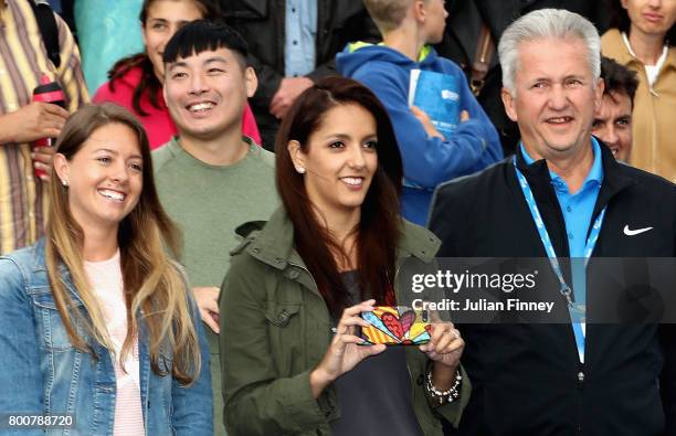 Alejandra Gutierrez wife of Jamie Murray of Great Britain watches on after he and his partner Bruno Soares of Brazil defeat Julien Benneteau of...