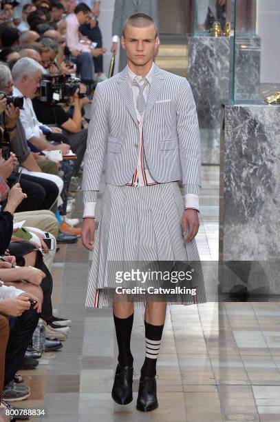Model walks the runway at the Thom Browne Spring Summer 2018 fashion show during Paris Menswear Fashion Week on June 25, 2017 in Paris, France.