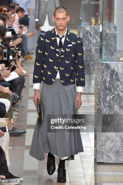 Model walks the runway at the Thom Browne Spring Summer 2018 fashion show during Paris Menswear Fashion Week on June 25, 2017 in Paris, France.