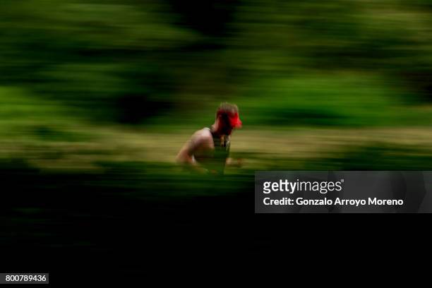 An athlete competes during the running course of the Ironman 70.3 UK Exmoor at Wimbleball Lake on June 25, 2017 in Somerset, United Kingdom.