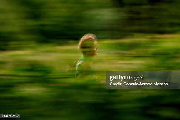 An athlete competes during the running course of the Ironman 70.3 UK Exmoor at Wimbleball Lake on June 25, 2017 in Somerset, United Kingdom.