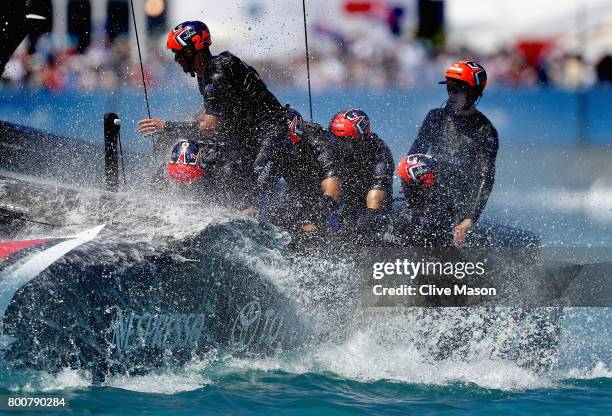 Emirates Team New Zealand helmed by Peter Burling cross the finish line and win race 8 on day 4 of the America's Cup Match Presented by Louis Vuitton...