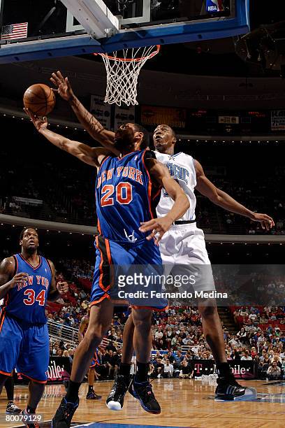 Dwight Howard of the Orlando Magic blocks a shot against Jared Jeffries of the New York Knicks at Amway Arena March 1, 2008 in Orlando, Florida. NOTE...
