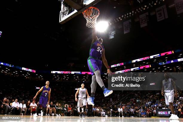 Kwame Brown of the 3 Headed Monsters dunks in the game against the Ghost Ballers during week one of the BIG3 three on three basketball league at...