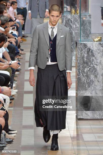 Model walks the runway at the Thom Browne Spring Summer 2018 fashion show during Paris Menswear Fashion Week on June 25, 2017 in Paris, France.