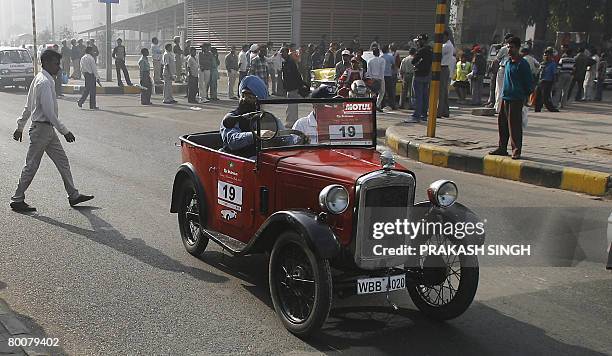 Indian motor enthusiast Jagraj Singh drives a 1928 Austin vintage car after the flag off of 'the 42nd Statesman Vintage & Classic Car Rally 2008' in...