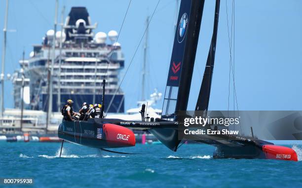 Skippered by Jimmy Spithill warms up before racing against Emirates Team New Zealand helmed by Peter Burling in race 7 on day 4 of the America's Cup...