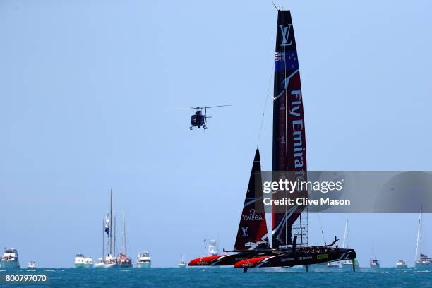 Emirates Team New Zealand helmed by Peter Burling in action racing on day 4 of the America's Cup Match Presented by Louis Vuitton on June 25, 2017 in...