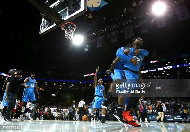 Deshawn Stevenson of Power celebrates with teammates after defeating Tri-State during week one of the BIG3 three on three basketball league at...