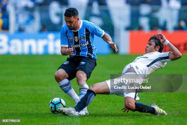 Edilson of Gremio battles for the ball against Angel Romero of Corinthians during the match Gremio v Corinthians as part of Brasileirao Series A...