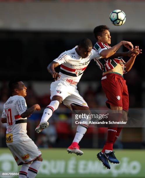 Denilson of Sao Paulo and Lucas of Fluminense in action during the match between Sao Paulo and Fluminense for the Brasileirao Series A 2017 at...