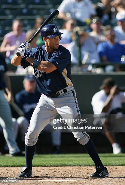 Gabe Kapler of the Milwaukee Brewers bats against the Oakland Athletics during the spring training game at Phoenix Municipal Stadium on February 29,...