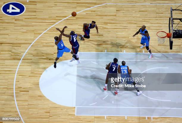 Cuttino Mobley of Power shoots against Bonzi Wells of Tri-State during week one of the BIG3 three on three basketball league at Barclays Center on...