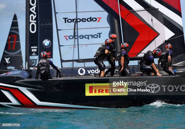 Emirates Team New Zealand helmed by Peter Burling cross the line to win race 8 on day 4 of the America's Cup Match Presented by Louis Vuitton on June...