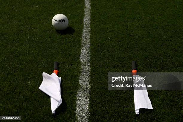 Dublin , Ireland - 25 June 2017; An 'O'Neills' football and two linesmens' flags on the grass before the Leinster GAA Football Senior Championship...