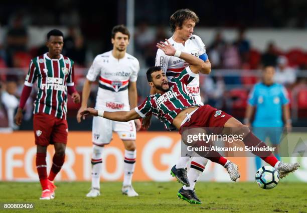 Henrique Dourado of Fluminense and Lugano of Sao Paulo in action during the match between Sao Paulo and Fluminense for the Brasileirao Series A 2017...