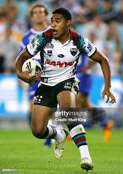 Michael Jennings of the Panthers runs with the ball during the NRL trial match between the Bulldogs and the Penrith Panthers at ANZ Stadium on March...