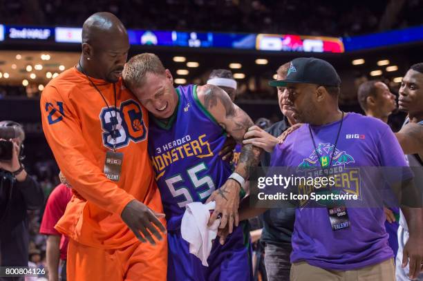 Headed Monsters player Jason Williams is helped off the court after an injury during a BIG3 Basketball League game on June 25, 2017 at Barclays...