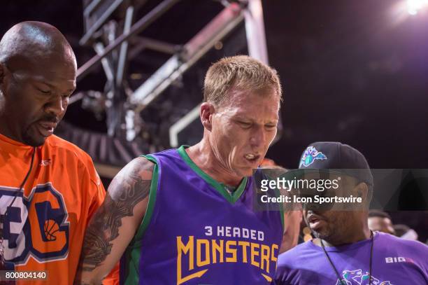 Headed Monsters player Jason Williams is helped off the court after an injury during a BIG3 Basketball League game on June 25, 2017 at Barclays...