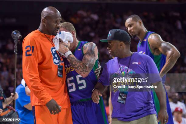 Headed Monsters player Jason Williams is helped off the court after an injury during a BIG3 Basketball League game on June 25, 2017 at Barclays...