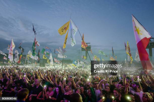 The crowd lights up as Ed Sheeran performs on the Pyramid stage on day 4 of the Glastonbury Festival 2017 at Worthy Farm, Pilton on June 25, 2017 in...
