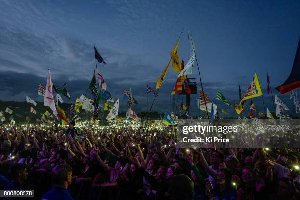 The crowd lights up as Ed Sheeran performs on the Pyramid stage on day 4 of the Glastonbury Festival 2017 at Worthy Farm, Pilton on June 25, 2017 in...