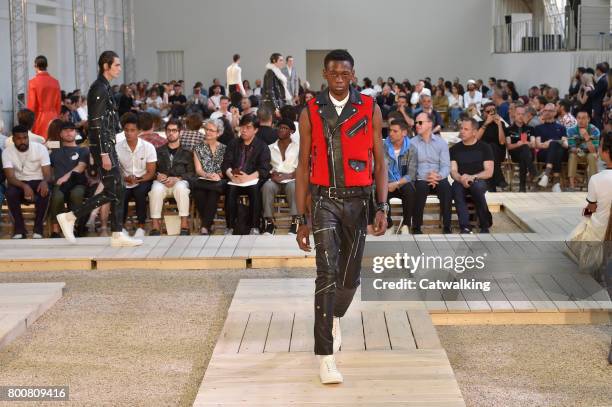 Models walk the runway at the Alexander McQueen Spring Summer 2018 fashion show during Paris Menswear Fashion Week on June 25, 2017 in Paris, France.