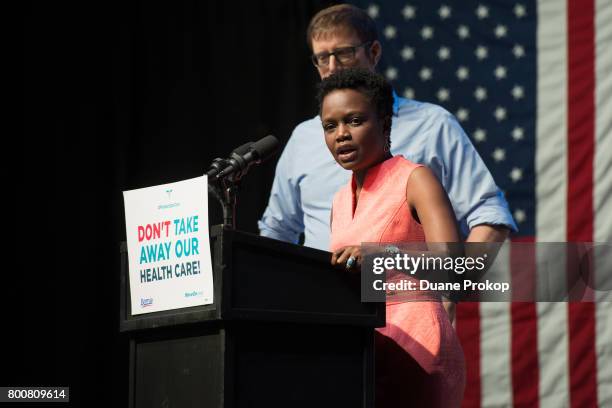 Ben Wikler and Karine Jean-Pierre of MoveOn.org speak during a emergency rally to stop TrumpCare at Express Live on June 25, 2017 in Columbus, Ohio.