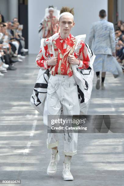 Model walks the runway at the Sankuanz Spring Summer 2018 fashion show during Paris Menswear Fashion Week on June 25, 2017 in Paris, France.