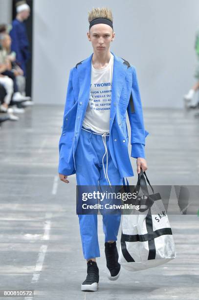 Model walks the runway at the Sankuanz Spring Summer 2018 fashion show during Paris Menswear Fashion Week on June 25, 2017 in Paris, France.