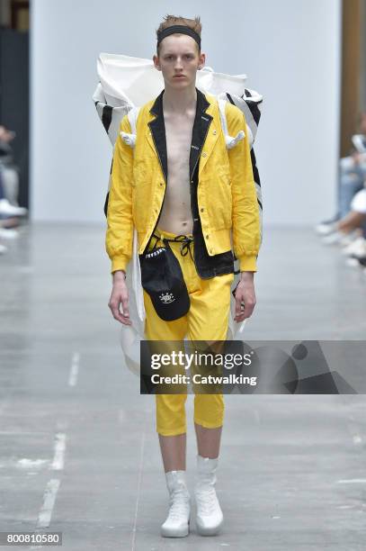 Model walks the runway at the Sankuanz Spring Summer 2018 fashion show during Paris Menswear Fashion Week on June 25, 2017 in Paris, France.