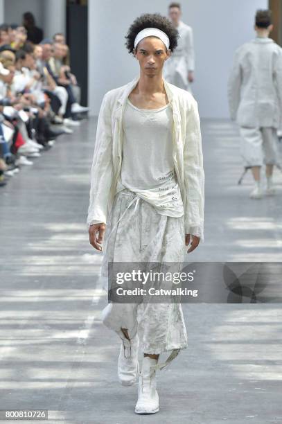 Model walks the runway at the Sankuanz Spring Summer 2018 fashion show during Paris Menswear Fashion Week on June 25, 2017 in Paris, France.