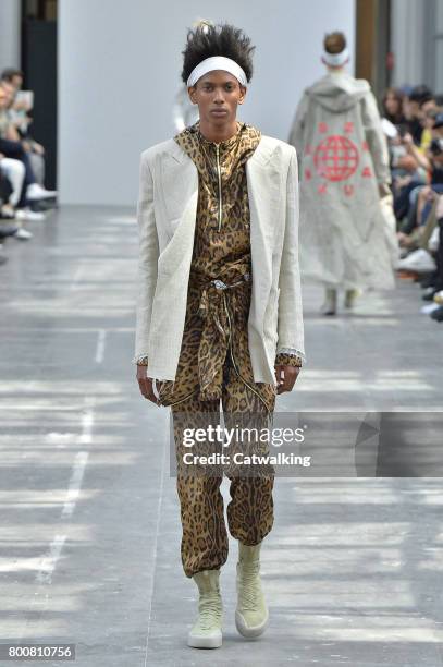 Model walks the runway at the Sankuanz Spring Summer 2018 fashion show during Paris Menswear Fashion Week on June 25, 2017 in Paris, France.