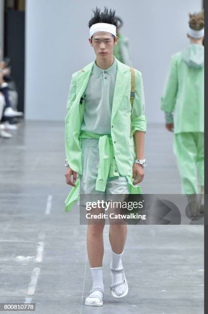 Model walks the runway at the Sankuanz Spring Summer 2018 fashion show during Paris Menswear Fashion Week on June 25, 2017 in Paris, France.