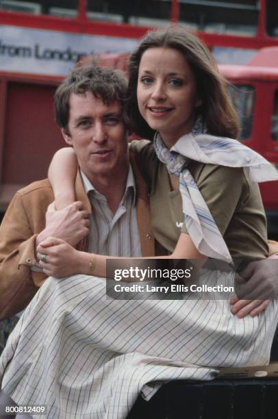 English actor John Nettles who appears in character as Jim Bergerac in the television drama series 'Bergerac', posed with French actress Aniouta...