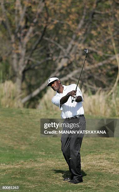 Fiji golfer Vijay Singh drives the ball on the fifteenth green during the final round of the Johnnie Walker Classic 2008 in Gurgaon on the outskirts...